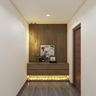 Compact Foyer with Wooden Paneling - Livspace