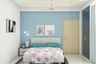 Compact Bedroom with Blue Accent Wall - Livsspace