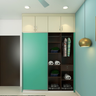Cyan Sliding Door Modern Wardrobe Design with Loft Storage - Livspace