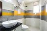 Bathroom With High Gloss Tiles - Livspace