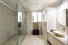Spacious Bathroom Will Tall Storage Units - Livspace