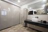 Bathroom With Stone Cladding Tiles - Livspace