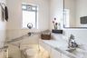 Minimal Bathroom With Marble Details - Livspace
