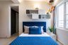 Guest Bedroom With Velvet Headboard - Livspace