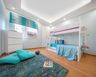 Kids' Room With White Bunk Bed And Closed Storage Unit - Livspace