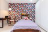 Kid's Room With a Football-Themed Wallpaper - Livspace
