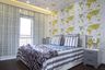 Kids' Room With A Double Bed And Dark Wooden Flooring - Livspace