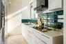 Turquoise And White Parallel Kitchen Design - Livspace