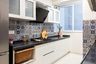 12x7 Ft Modern Parallel Kitchen Design With White Cabinets - Livspace