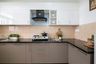 L-Shaped Spacious Kitchen Design - Livspace