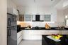White L-Shaped Kitchen Design - Livspace