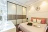 Bedroom Design With A King Size Bed And Sliding Wardrobe - Livspace