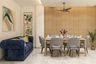 Spacious Dining Room Design With 6-Seater Grey And Wood Dining Table, Blue Velvet Sofa And Wooden Wall Panelling - Livspace
