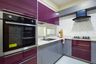 L shaped Purple And Grey Glossy Cabinets With Tall Appliance Unit - Livspace