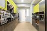 Modular Parallel kitchen Design with yellow and wood cabinets and Grey Subway tiles - Livspace