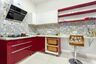 L-Shaped White and Red Kitchen Design