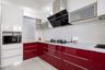 L-Shaped Red And White Modular Kitchen Design