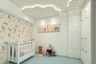 Blue Flooring Design For Kids Room With White Crib And Cloud-Shaped False Ceiling - Livspace