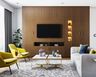 Floor-To-Ceiling Walnut Wood TV Cabinet Design With In-Built Shelves And Cabinet Storage, 3-Seater White Sofa And Yellow Accent Chairs - Livspace