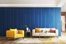 3D Blue Wall Design With Yellow Accent Chair And Cream Toned Sofa - Livspace