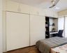 2-Door Champagne Sliding Wardrobe With Loft Storage And Integrated Study Table - Livspace