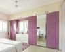 Modern Glossy Lavender And White 4-Door Swing Wardrobe Design With  Mirrors And Drawer Unit - Livspace