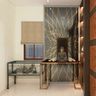 Compact Foyer Design With Glossy Dark Grey Wall Panel, Golden Floral Motif And Glossy Console Table With Buddha Statue - Livspace