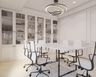 White Modern Office Decoration Ideas With 6-Seater Table, Swivel Chairs And Bookshelf - Livspace