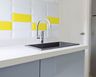 Black Quartz Top Mount Basin Wash With White-Yellow Dado Tiles And White Kitchen Countertop - Livspace