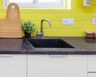 Black Quartz Single Bowl Square Kitchen Sink Design With Yellow Kitchen Backsplash - Livspace