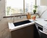 Rectangular Quartz Undermount Kitchen Sink With Single Bowl And Marble Backsplash - Livspace