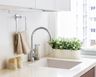 Off-White Square Top Mount Kitchen Sinks With Steel Tap And Potted Plant - Livspace