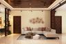 Living Room Design With L Shaped Sectional Sofa In Beige Tones, Gold Wall Decor And Wooden False Ceiling Design - Livspace