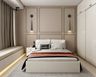 Guest Bedroom Design With White Bed, Beige Bay Seater And 2-Door White Sliding Wardrobe - Livspace