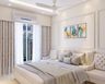 Master Bedroom With Off-White Bed And Headboard, Off-White Accent Chairs And White Wall With Floral Art Work - Livspace