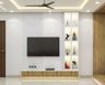 Well-lit Wood And White TV Unit Design With Floor-Mounted Console, White Open Shelves And White Fluted Back Panels - Livspace