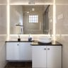 7X6 Ft White And Beige Bathroom Design With Black Countertop - Livspace