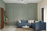 Green Living Room Design With Decorative Wall Trims - Livspace