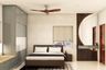 Bedroom Design With A King Size Bed And Window Seating - Livspace