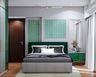 Modern Guest Bedroom Design With Green And White Theme And Shutter Wardrobe - Livspace