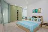 Kids Room Design With Glossy Green Swing Wardrobe - Livspace