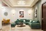 Living Room Design With Green L-Shaped Sofa- Livspace