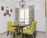 Mustard And Wood 4-Seater Dining Room Design - Livspace