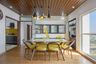 Yellow And Wood Dining Room Design With Wooden False Ceiling - Livspace