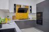 U-shaped grey and white kitchen with white and yellow dado tiles - Livspace