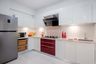 White And Fire Red L Shaped With Quartz Countertop - Livspace