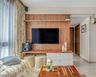 White And Walnut Bronze TV Unit Design With Wooden Paneling - Livspace