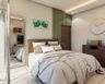Guest Room Design With Pastel Green Acent Wall And Leafy Motifs - Livspace