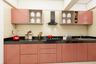 Rose Pink Straight Modular Kitchen Design With Granite Countertop - Livspace