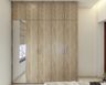 Wooden 4-Door Swing Wardrobe Design With Mirror - Livspace
